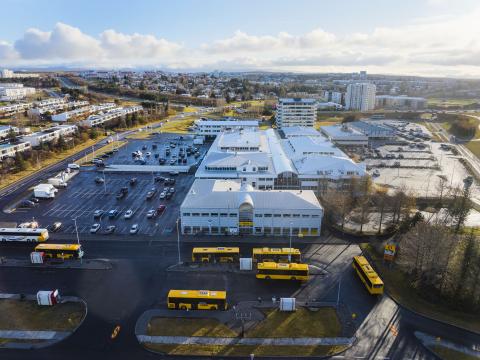 Mjódd, aerial view. Buses and the front of the bus station in the foreground