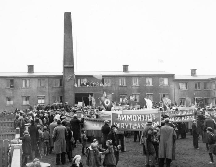 Outdoor meeting at the worker housing.