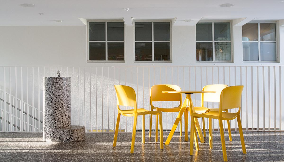Tables and chairs in the lobby of Sundhöll Reykjavík Pool