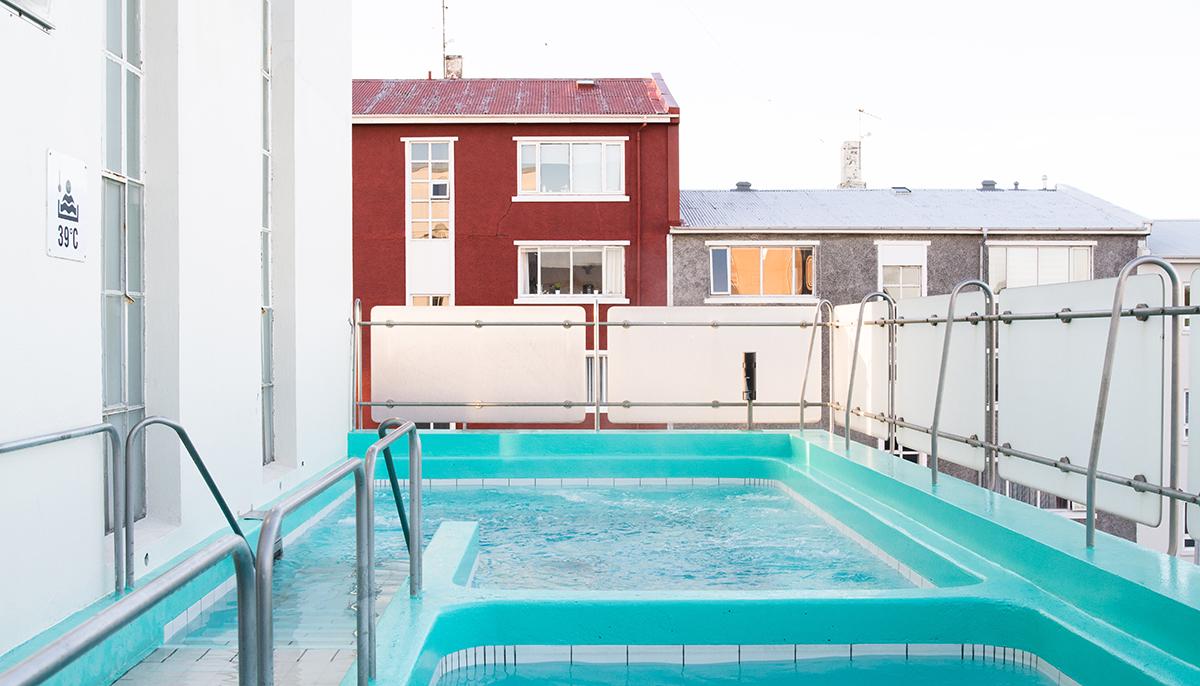 Hot tubs on the upper level of Sundhöll Reykjavík Pool