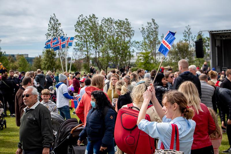 A group of people in Hljómskálagarður on National Day of Iceland