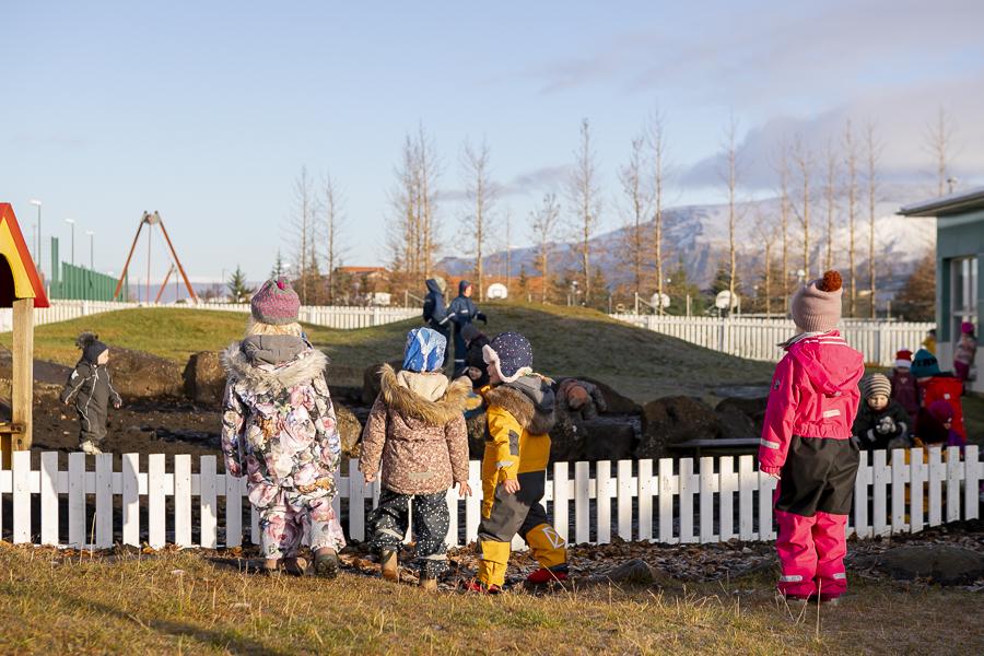 Children and playground equipment on the Engjaborg grounds.