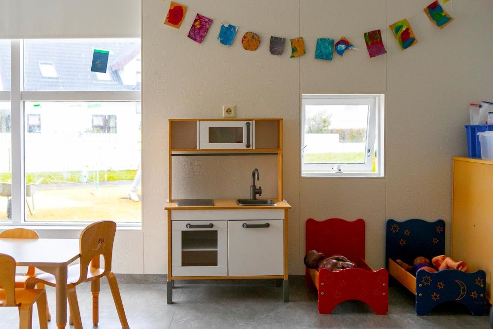 Play kitchen and doll bed at Gullborg Preschool