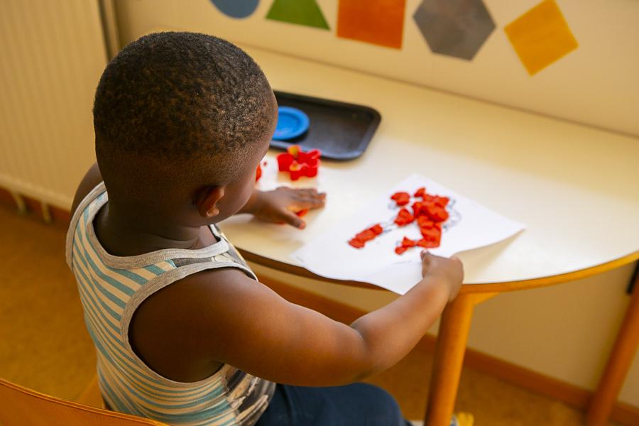 Child playing inside Holt.