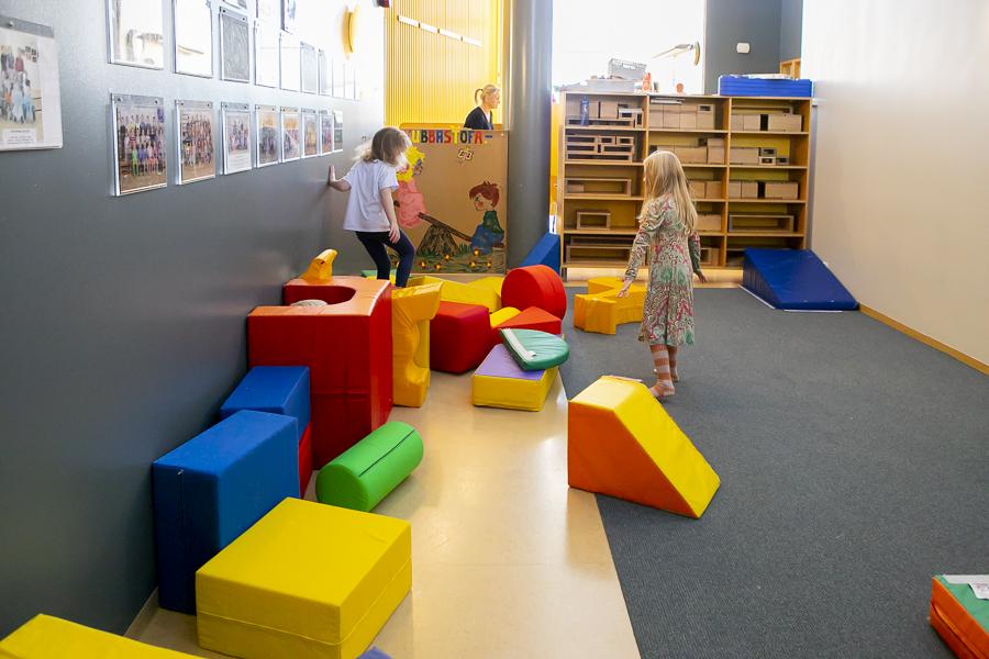 Children playing with a pillow at Maríuborg.