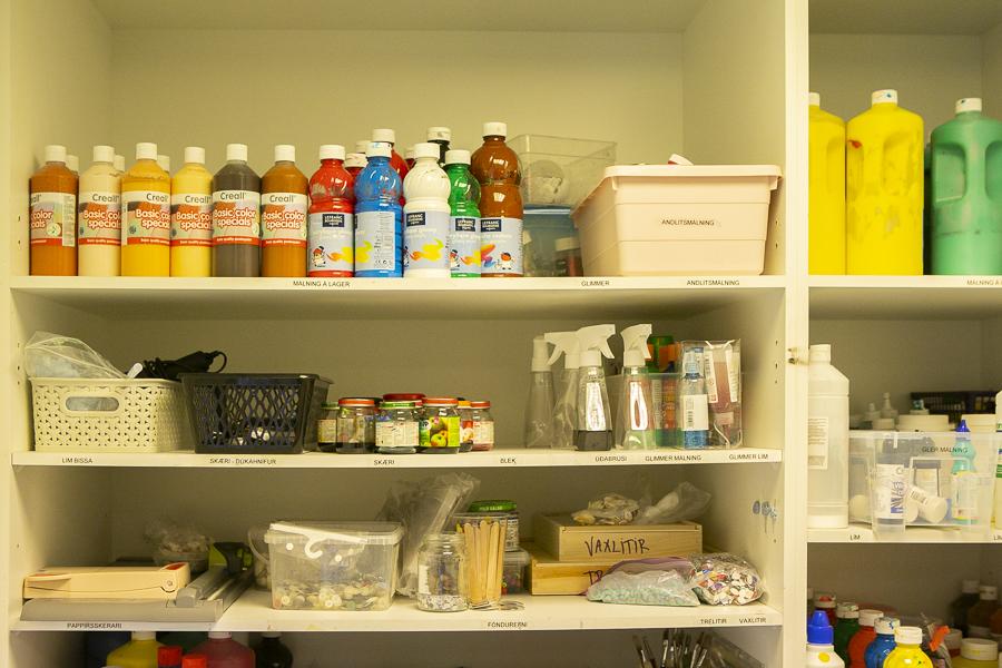 Shelves with painting and art supplies