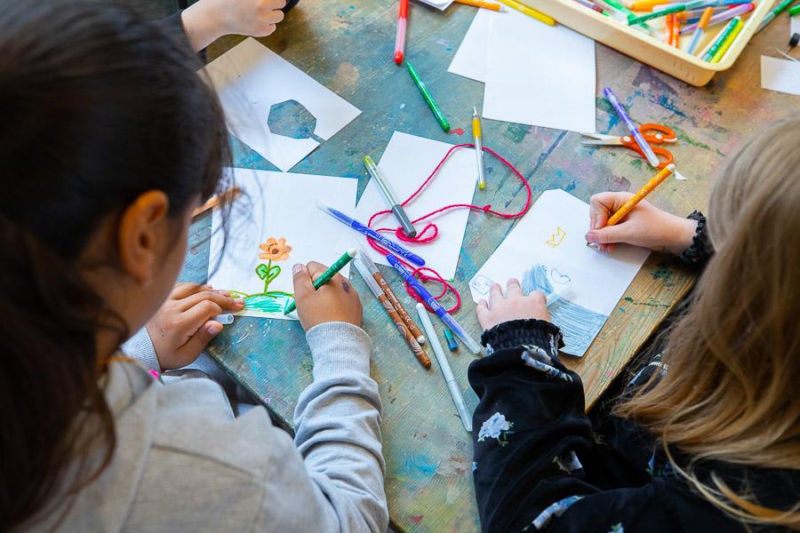 Children drawing at the Dalheimar after-school program