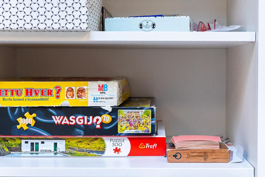 Shelf with games at Eldflaugin after-school program.