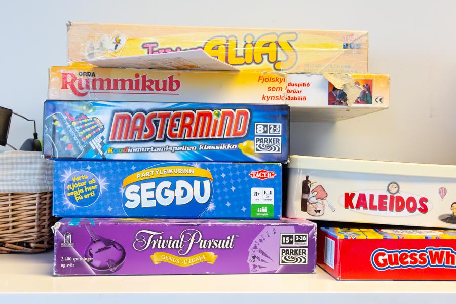 Games arranged on a shelf. 