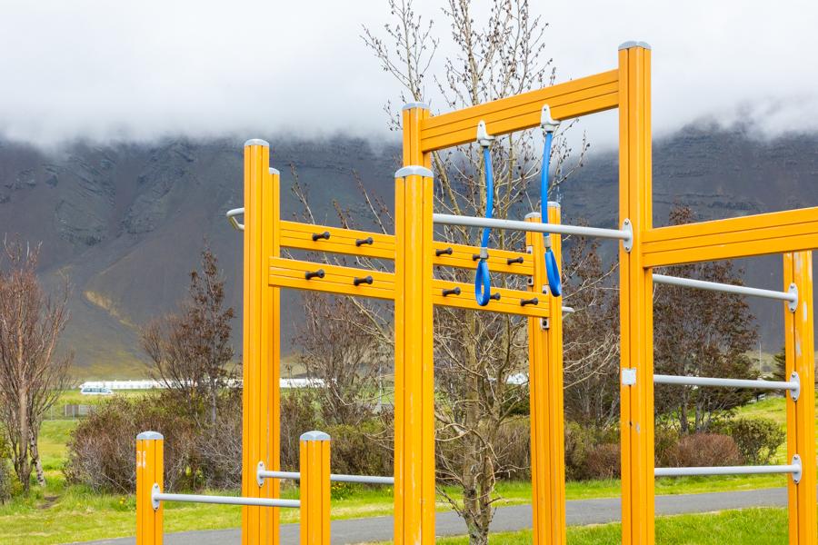 Yellow jungle gym on a school playground.