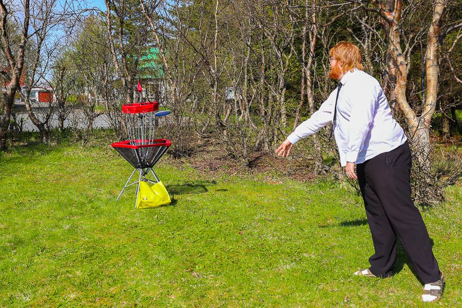 Person playing disc golf. 