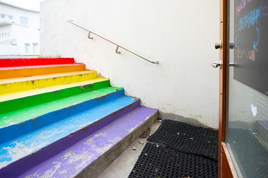 Stairs painted in rainbow colors. 
