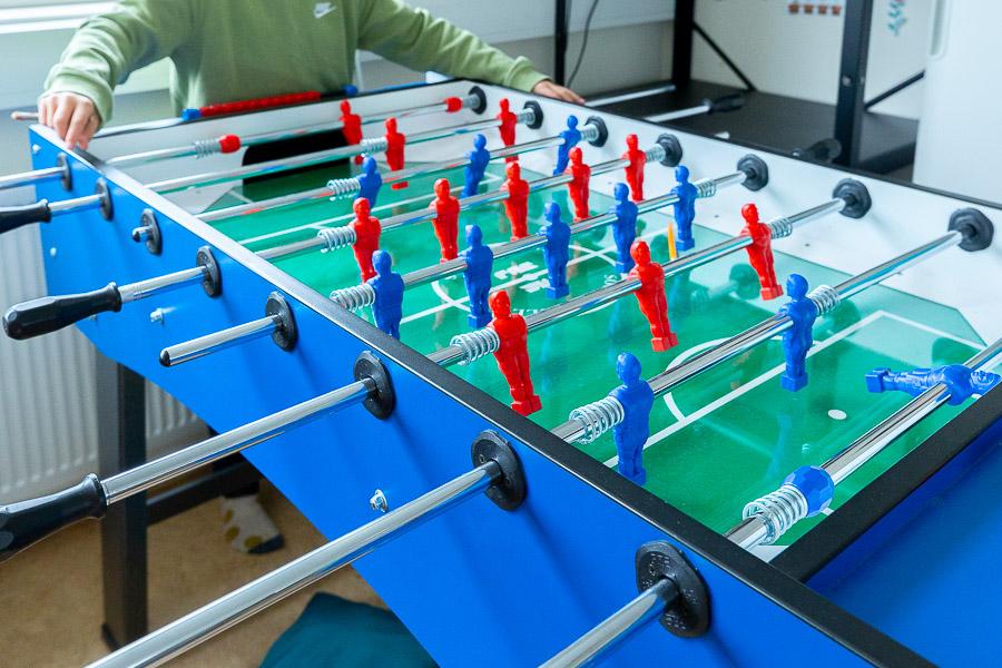 A child playing foosball