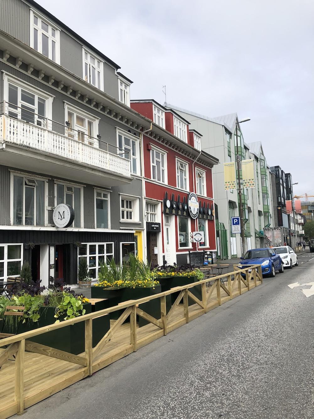 Parklet, house, and vegetation.