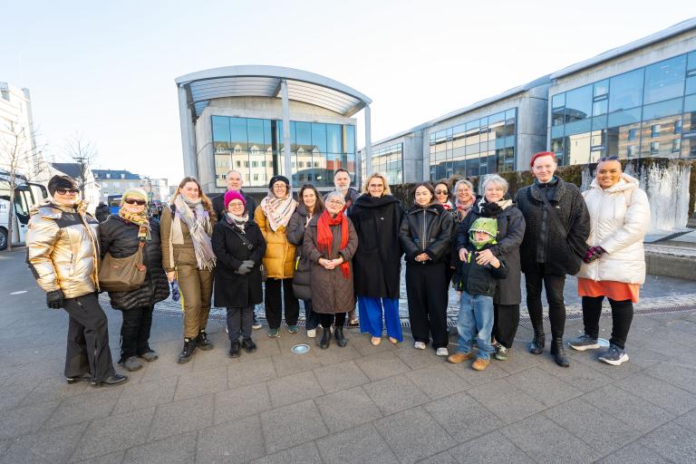 A group of people at City Hall after the Greenlandic flag had been raised.