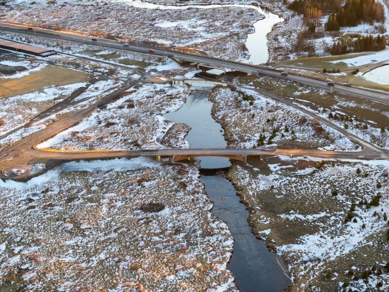 Aerial view of the river and two bridges.