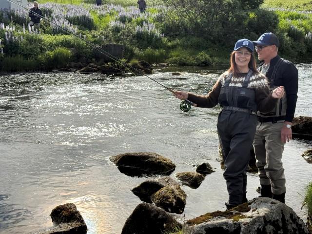 Jensína fishes with a guide at Breiðan on the Elliðaár river this morning.